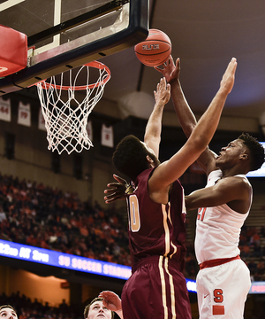 Tyler Roberson puts up a shot near the rim in Syracuse's 11-point win over Elon. The junior forward had an impressive 20 points and 16 rebounds in the win.