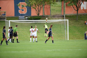 Courtney Brosnan rises up for a save against No. 20 Notre Dame on Sunday. SU tied the Fighting Irish, 1-1.