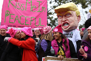 Krista Suh, co-founder of the P*ssyhat project who holds a water bottle in this picture, helped knit the hats that hundreds of thousands of protesters were wearing on Saturday during the Women's March.