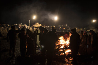 Peaceful protestors gather around a fire at Standing Rock Native American Reservation in North Dakota and South Dakota. Many Syracuse University community members have joined in the efforts to protest against the Dakota Access Pipeline.